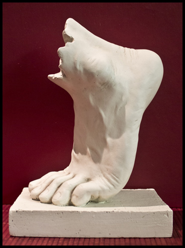 Foot sculpture representing patient education resources for podiatry care.
